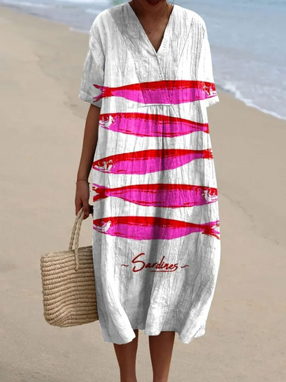 Kasandra - Sukienka z lejącym się materiałem z marynistycznym wzorem