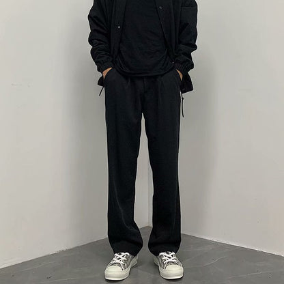 Caleb - eleganckie, luźno skrojone, proste spodnie męskie